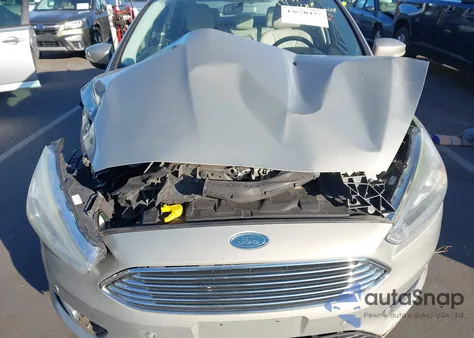 2015 Ford Focus Titanium from USA, damaged, VIN 1FADP3J23FL304788